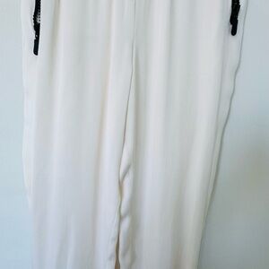Emilio Pucci Elegant White Women's Pants with black zippers, size 6